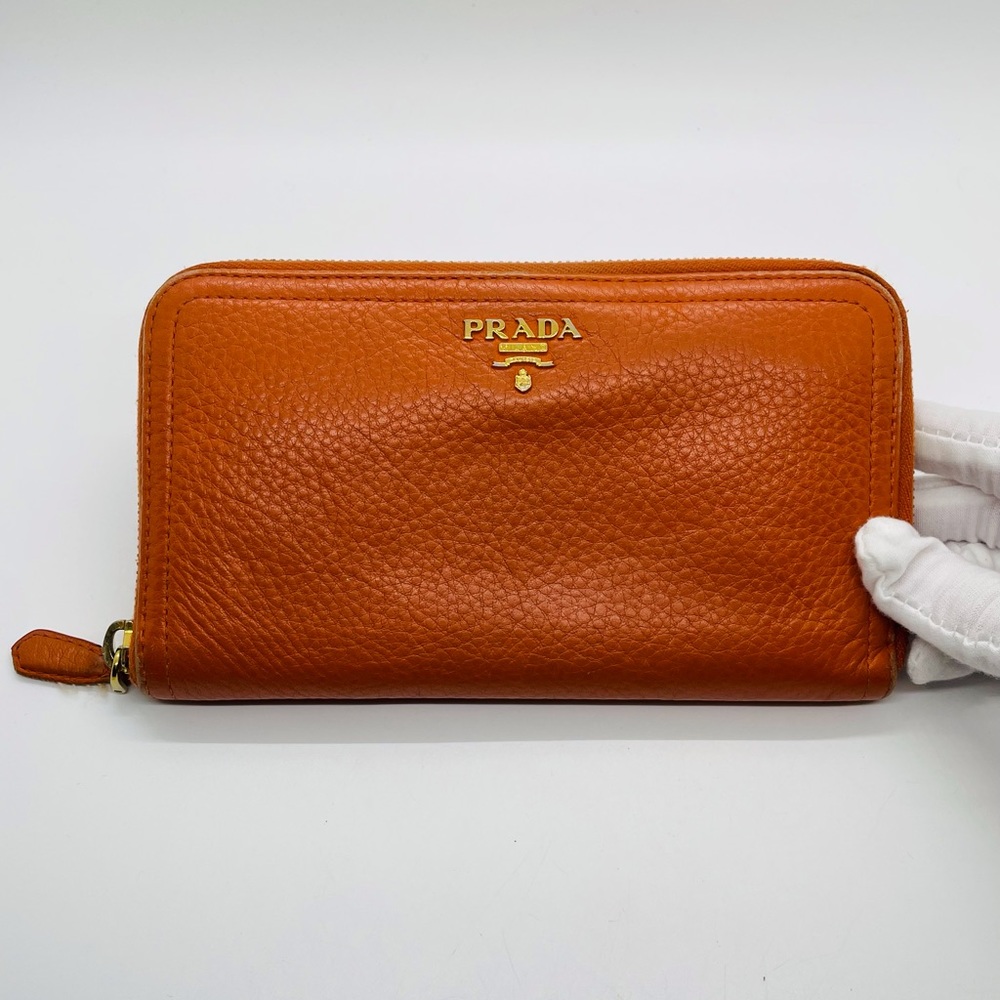 Prada large zip around leather wallet